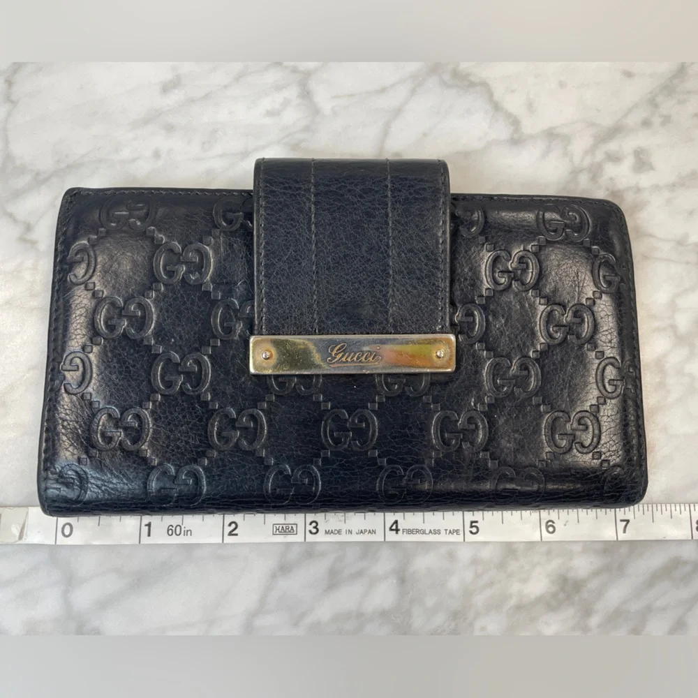 Gucci Black Embossed GG Leather Wallet with Gold Nameplate